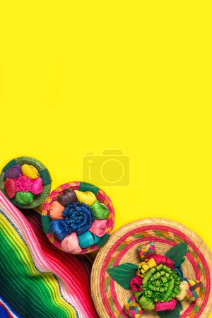 Photo for Mexican handicrafts and serape on yellow background. Mexican independence concept. Cinco de mayo background. - Royalty Free Image