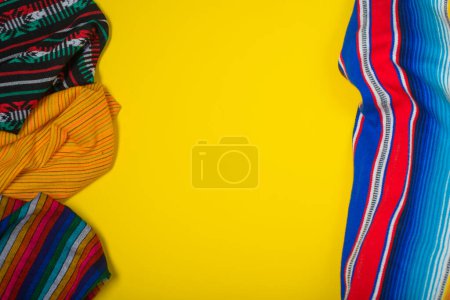 Photo for Serape on yellow background. Mexican independence concept. Cinco de mayo background. - Royalty Free Image