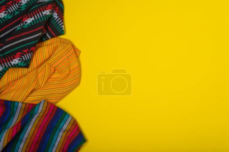 Photo for Serape on yellow background. Mexican independence concept. Cinco de mayo background. - Royalty Free Image