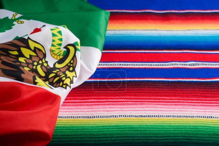 Serape and Mexican flag. Cinco de Mayo background.