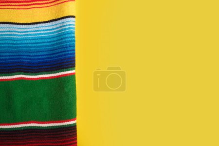 Photo for Serape on yellow background. Cinco de mayo background. - Royalty Free Image
