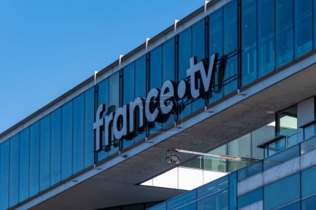 Photo for Paris, France - February 6, 2023: "France.tv" sign on the facade of the headquarters of France Televisions, the national program company which manages the activities of public television in France - Royalty Free Image