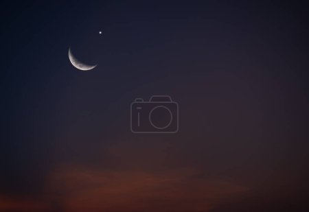 Photo for Moon Muharram Mubarak Ramadan Concept,Crecent Moon and Sky Dark Night Background Symbols,New Year Muharram,Eid al-fitr,Arabic Eid Al-adha Backdrop,Kareem Traditional Holy Allah Islam Muslim Sunset. - Royalty Free Image