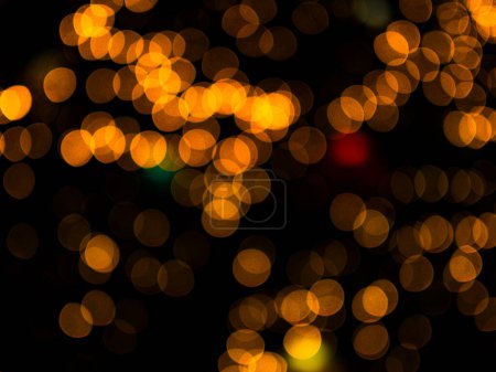 Orange Bokeh Licht Unschärfe Hintergrund, Abstrakte Rote Nacht City Weihnachten, verschwommene Textur Kreis im Freien, Muster Glitter-Effekt Funkelkreis Feuer Gelb Feier Frohes Neues Jahr Festliche Feiertage.