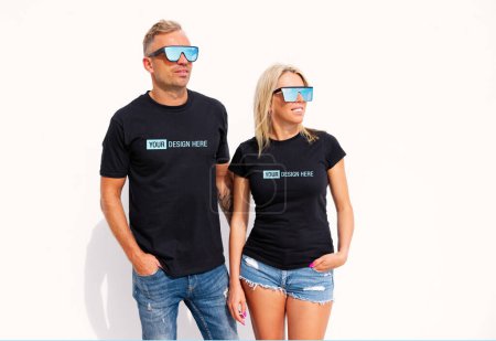 Photo for Woman and man wearing black t-shirts, mockup for your custom t shirt design - Royalty Free Image