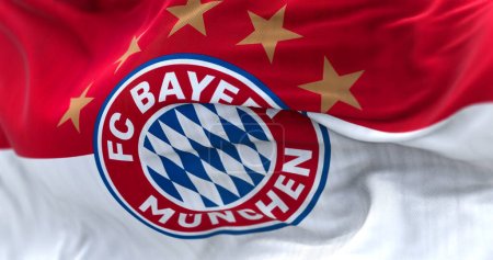 Foto de Munich, GER, June 2022: Fabric background with the Bayern Munich Flag waving. Bayern Munich is a German sports club based in Munich - Imagen libre de derechos