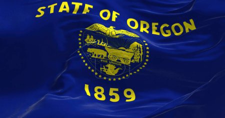 Téléchargez les photos : Vue rapprochée du drapeau de l'Oregon. L'Oregon est un État de la région du Pacifique Nord-Ouest des États-Unis. Tissu fond texturé. Concentration sélective. Illustration 3D - en image libre de droit