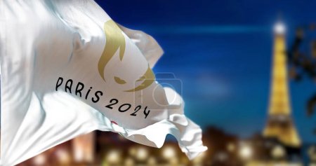 Téléchargez les photos : Paris, FR, Jan 2023: Paris 2024 Summer Olympics flag waving in the wind with blurred Paris skyline on the background at night. Realistic 3d illustration. Illustrative editorial - en image libre de droit
