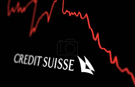 Photo for New York, US, March 2023: White Credit Suisse logo on a stock market performance chart trends. In March 2023, Credit Suisse experienced a sharp drop in its stock price. Illustrative editorial - Royalty Free Image