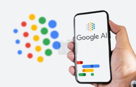 Photo for San Francisco US, Feb 2023: A hand holding a phone with the Google AI logo on the screen. White background with blurred logo. - Royalty Free Image