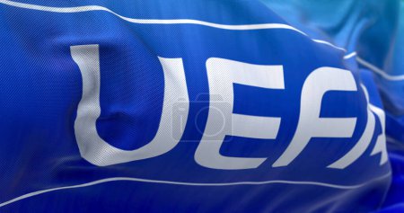 Photo for Nyon, CH, September 2022: flag with the UEFA logo waving in the wind. UEFA is the association that manages professional football in Europe. Illustrative editorial 3d illustration render - Royalty Free Image