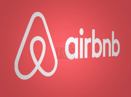 Foto de San Francisco, EE.UU., marzo de 2023: Logo de Airbnb sobre fondo rojo. Airbnb es una plataforma para reservar alojamiento. Ilustración editorial ilustrativa. Enfoque selectivo - Imagen libre de derechos