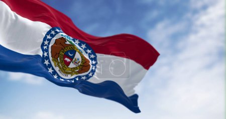 Photo for Missouri state flag waving on a clear day. Red, white, blue horizontal stripes with Great Seal of Missouri in center. 3d illustration render. Textured background. Selective focus. Fluttering textile - Royalty Free Image