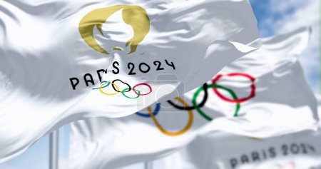 Foto de París, FR, mayo 2023: Bandera de París 2024 Juegos Olímpicos ondeando en el viento. Próximo evento deportivo internacional. Ilustrativo editorial 3d illustration render. Enfoque selectivo - Imagen libre de derechos