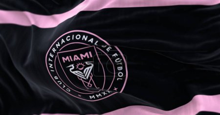 Photo for Miami, US, July 25 2023: Inter Miami football club flag waving in the wind. American professional soccer club. Illustrative editorial 3d illustration render. Selective focus. Close-up - Royalty Free Image