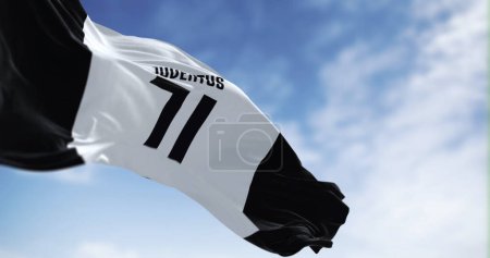 Photo for Turin, Italy, Aug 1 2023: Juventus Football Club flag waving on a clear day. Italian professional football club based in Turin. Illustrative editorial 3d illustration render. Selective focus - Royalty Free Image