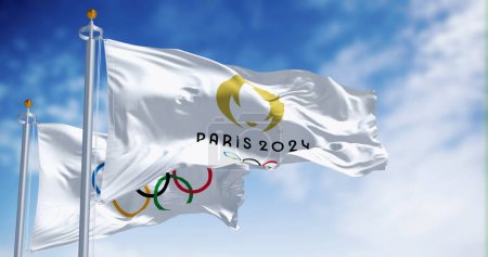 Photo for Paris, FR, Sept 12 2023: Paris 2024 and the Olympics Games flags waving in the wind. International sporting event. Illustrative editorial 3d illustration render. - Royalty Free Image