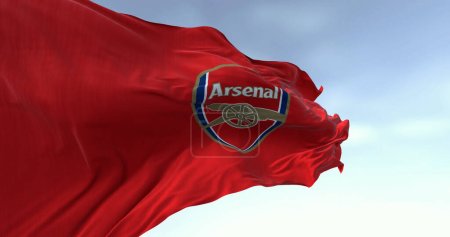 Photo for London, UK, oct. 15 2023: Close-up of Arsenal football club waving on a clear day. English professional football club. Premier League. Illustrative editorial 3d illustration. Rippling fabric - Royalty Free Image