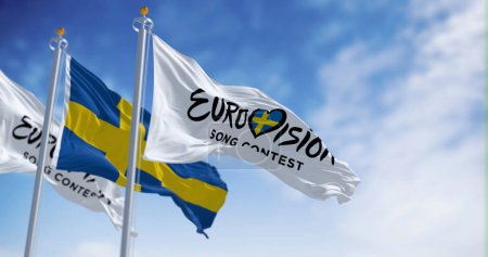 Téléchargez les photos : Malm0, SE, 25 octobre 2023 : Concours Eurovision de la chanson 2024 et drapeaux nationaux de la Suède agitant par temps clair. Illustration éditoriale 3d rendu d'illustration. Concentration sélective - en image libre de droit