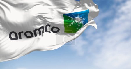 Photo for Dhahran, SA, Jan 10 2024: Flag of Aramco oil company waving in the wind. Aramco is the Saudi national hydrocarbon company. Illustrative editorial 3d illustration render - Royalty Free Image