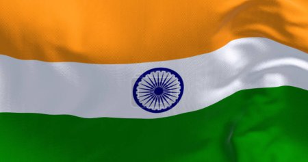 Téléchargez les photos : Gros plan du drapeau national de l'Inde agitant. Tricolore de safran, blanc et vert avec un chakra Ashoka bleu au centre. Illustration 3D rendu. Textiles flottants - en image libre de droit
