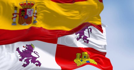 Castile and Leon and national spanish flags waving on a clear day. Autonomous community in north-western Spain. 3d illustration render. Selective focus. Rippled textile
