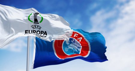 Photo for Athens, GR, Mar 15 2024: Flags with UEFA and UEFA Europa Conference League logo waving in the wind. Illustrative editorial 3d illustration render - Royalty Free Image