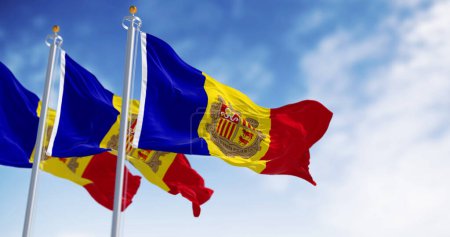 Banderas del Principado de Andorra ondeando al viento en un día despejado. Rayas verticales azul-amarillo-rojo con escudo de armas en el centro. 3d render ilustración. Tejido ondulado.