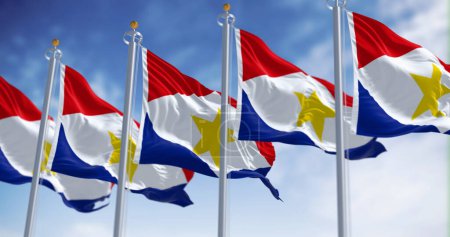 Flags of Saba waving in the wind on a clear day. Special municipality of the Netherlands located in the Caribbean Sea. 3d illustration render. Selective focus. Rippled fabric
