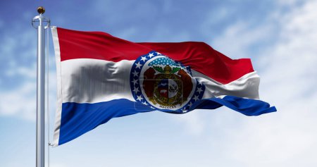 Missouri state flag waving on a clear day. Red, white, blue horizontal stripes with Great Seal of Missouri in center. 3d illustration render. Fluttering textile
