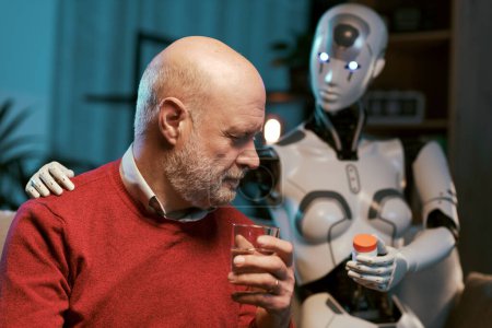 Foto de Robot de IA humanoide cuidando a un hombre mayor en casa y dando medicamentos recetados, cuidado de la salud y el concepto de tecnología - Imagen libre de derechos