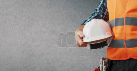 Photo for Professional worker wearing personal protective equipment: safety at work concept - Royalty Free Image