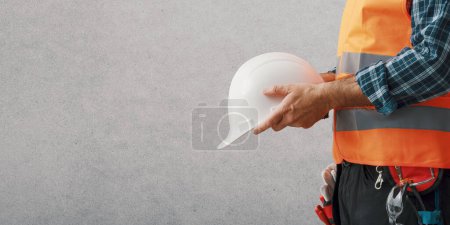 Photo for Construction worker wearing personal protective equipment: safety at work concept, banner with copy space - Royalty Free Image