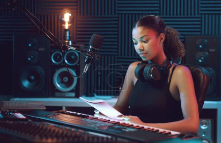 Photo for Young musician working in the recording studio, entertainment and creativity concept - Royalty Free Image