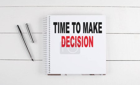Photo for TIME TO MAKE DECISION text written on a notebook on the wooden background - Royalty Free Image