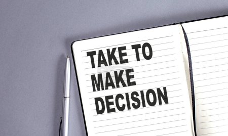 Photo for TAKE TO MAKE DECISION word on notebook with pen - Royalty Free Image