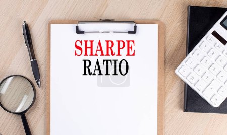 Photo for SHARE RATIO text on clipboard on wooden background - Royalty Free Image