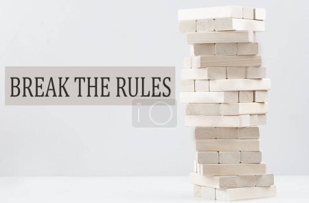 Photo for BREAK THE RULES text with wooden block stack on a white background , business concept - Royalty Free Image