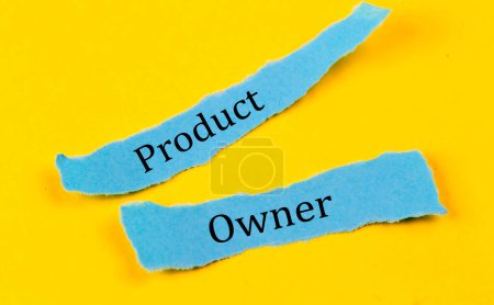 Photo for PRODUCT OWNER text on blue pieces of paper on yellow background, business concept - Royalty Free Image