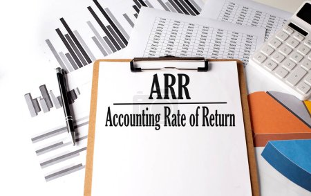 Photo for Paper with ARR ACCOUNTING RATE OF RETURN on chart background - Royalty Free Image