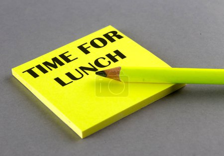 TIME FOR LUNCH on sticky on grey background