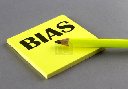 Photo for BIAS text written on sticky on grey background - Royalty Free Image