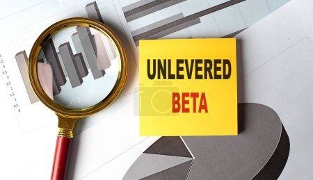 Photo for UNLEVERED BETA text on a sticky on chart - Royalty Free Image