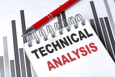 Photo for TECHNICAL ANALYSIS text written on a notebook with pen on chart - Royalty Free Image