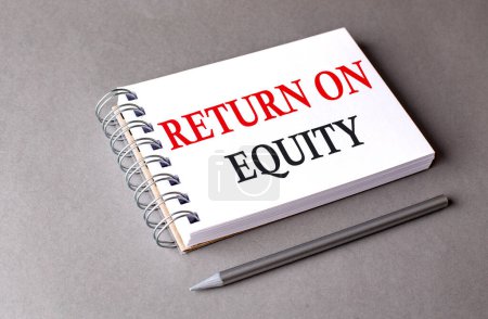 RETURN ON EQUITY word on a notebook on grey background