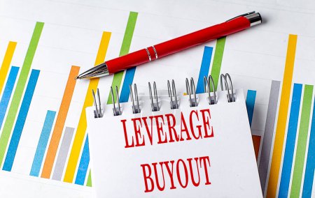 LEVERAGE BUYOUT text on notebook with chart and pen business concept