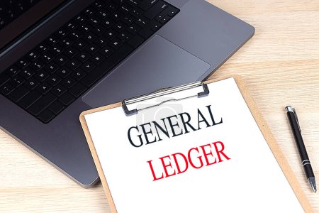 GENERAL LEDGER text on clipboard on laptop. Business