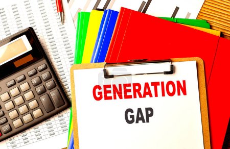 GENERATION GAP text on a clipboard with calculator and color folder . 