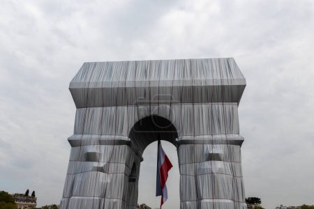 Paris triumphal arch packed in gray weather