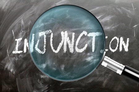 Injunction - learn, study and inspect it. Taking a closer look at injunction. A magnifying glass enlarging word 'injunction' written on a blackboard